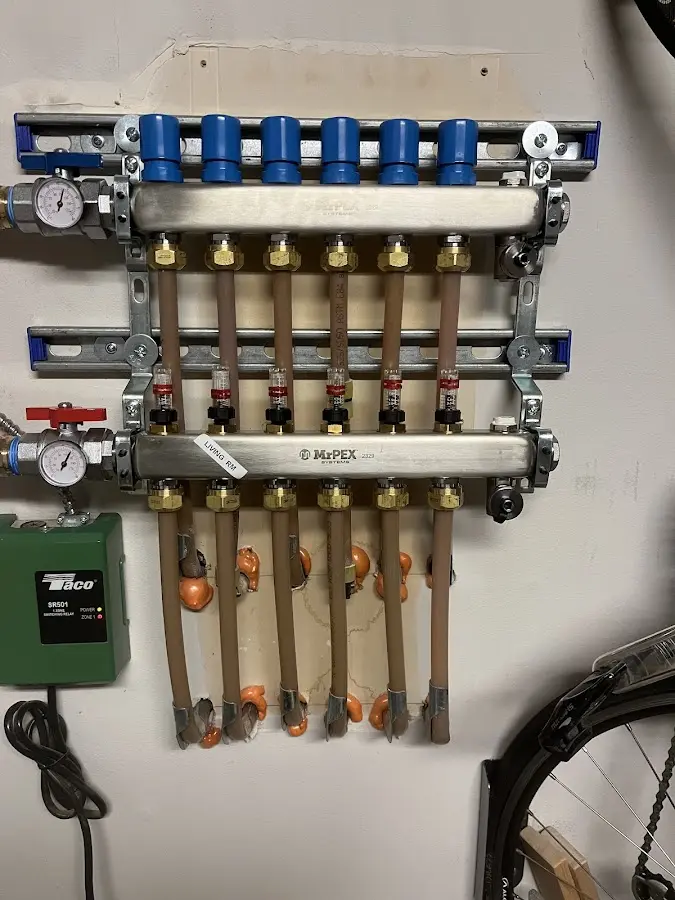 Plumber performing Water Heater Repair at a residential property in Marathon